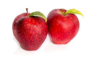 Fresh two red apples isolated on white background.