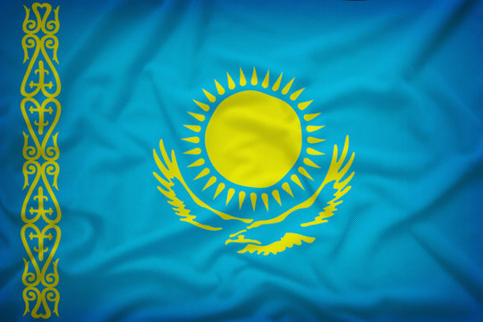 kazakhstan flag on the fabric texture background,Vintage style