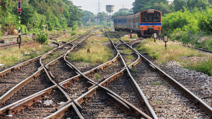 Obraz premium Line of railway crossing in rural of Thailand.