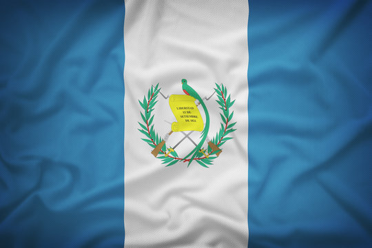 Guatemala flag on the fabric texture background,Vintage style