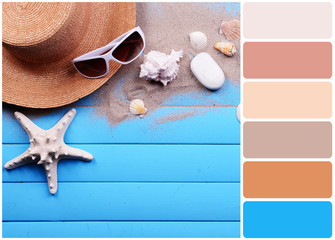 Travel accessories on wooden background and palette of colors
