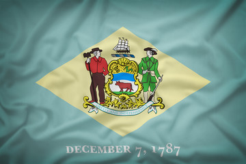 Delaware flag on the fabric texture background,Vintage style