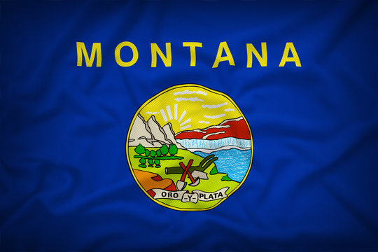 Montana flag on the fabric texture background,Vintage style