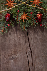 Old grunge wooden board with Christmas border.