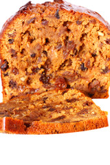 Fruit loaf cake.
Sliced fruit loaf cake isolated on white background.