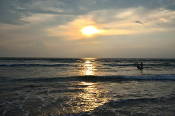 Surfer im Meer / Indischer Ozean