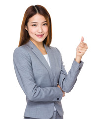 Young businesswoman with thumb up