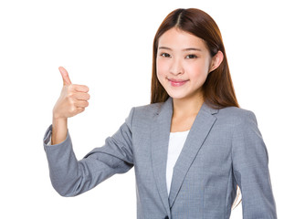 Businesswoman with thumb up