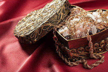 Jewelry and other decorations in decorative box heart shape