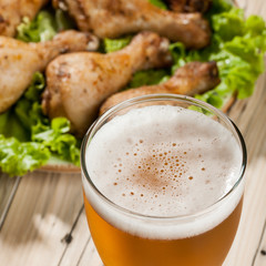 Light beer and baked chicken legs