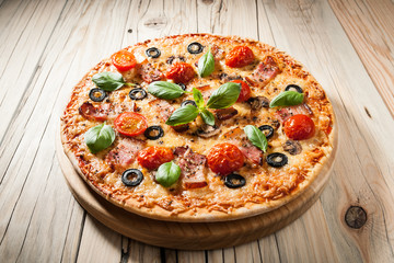 Home baked pizza with bacon and mushrooms