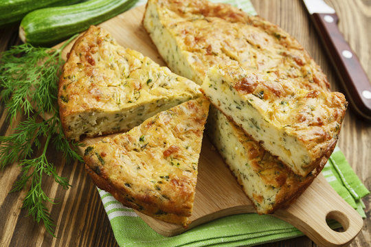 Zucchini pie with cheese and herbs