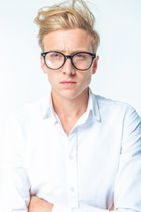 Fototapeta premium Picture of a casual young man looking at the camera