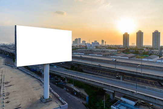 Blank billboard at twilight for advertisement.