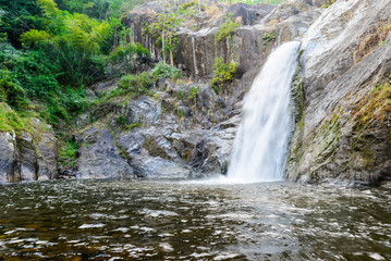 Fototapeta na wymiar Waterfall in deep rain forest.