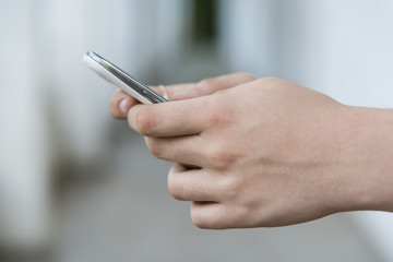Teenage girl using mobile smart phone