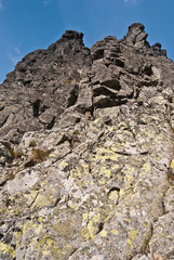 view to sharp rock towers from Zleb Kulczynskiego on Orla Perc hiking trail in Tatry mountains