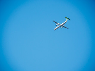 airplane on blue sky and white clouds