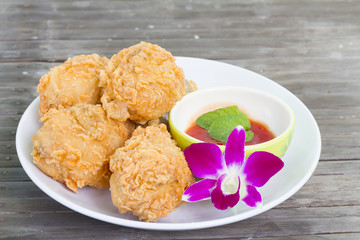 Fried chicken and decorative orchid