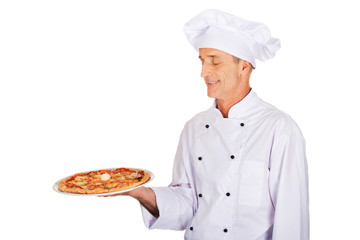 Chef baker with italian pizza