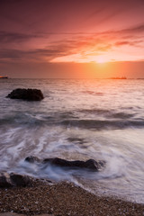 Fototapeta na wymiar Tropical beach beautiful sunset at Sea