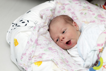 Yawning newborn
