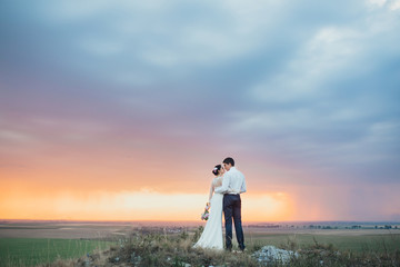 Beautiful wedding day, love on the sunset