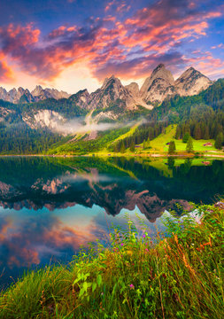 Colorful summer sunrise on the Vorderer Gosausee lake