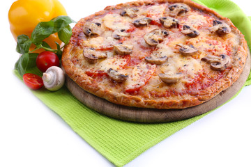 Tasty pizza with vegetables and napkin close up