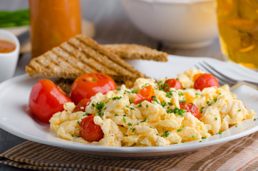 Scrambled eggs with baked tomatoes and chives, panini Scrambled eggs with baked tomatoes