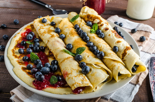 Pancakes with jam and blueberries