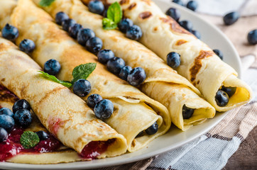 Pancakes with jam and blueberries
