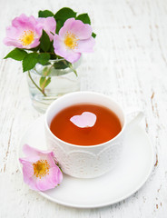 Cup of tea and dogrose