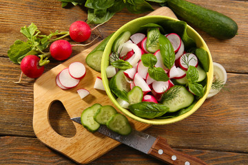 Fresh vegetable salad on table close up