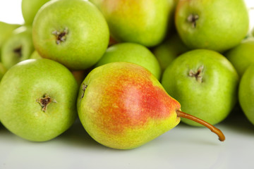 Heap of ripe tasty pears close up