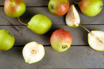Ripe tasty pears on table close up