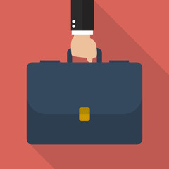 Businessman hand holding briefcase