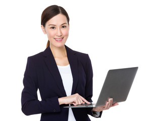 Young businesswoman use of the laptop computer
