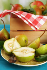 Fresh pears on wooden table, closeup