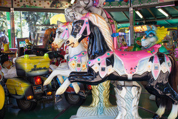 Obraz na płótnie Canvas Colorful Carousel Horses