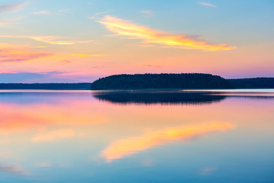 Sunset on a lake © sborisov