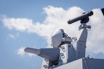 Modern weapons on the deck of a military ship. Weapon system for defense