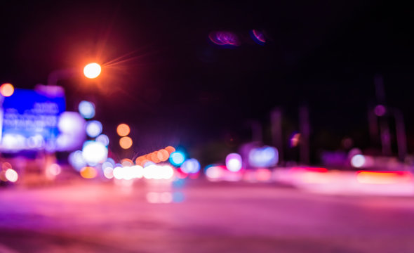 image of blur street  bokeh background with purple tone lights