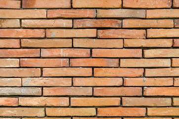 Weathered red brick wall texture seamlessly tileable
