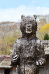 Fototapeta na wymiar wooden bear at Hokkaido