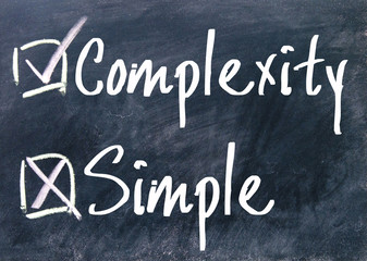 simple and complexity choice sign on blackboard