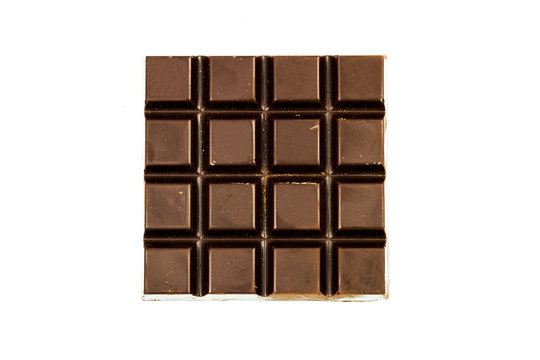 Black chocolate bar isolated on white background, top view