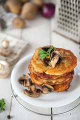 Crunchy potato pancakes with mushrooms