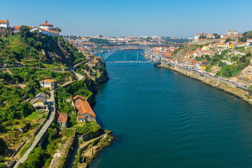 Obraz premium Porto historic city centre with Ponte Luis I Bridge over Douro river (Portugal)