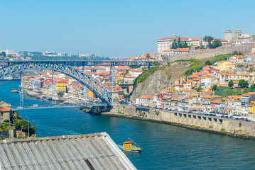 Fototapeta premium Porto historic city centre with Ponte Luis I Bridge over Douro river (Portugal)